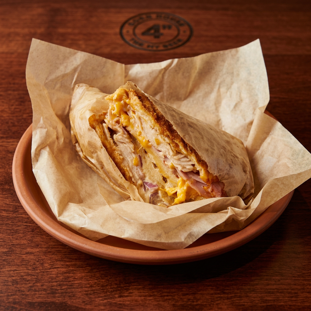 #7 Knuckle Sandwich (Ham and Turkey Melt).
